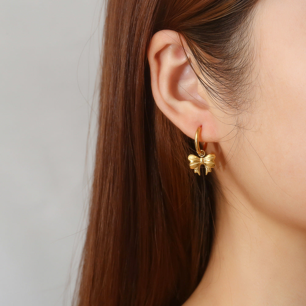 Boucle d'oreille à nœud en acier et titane pour femmes
