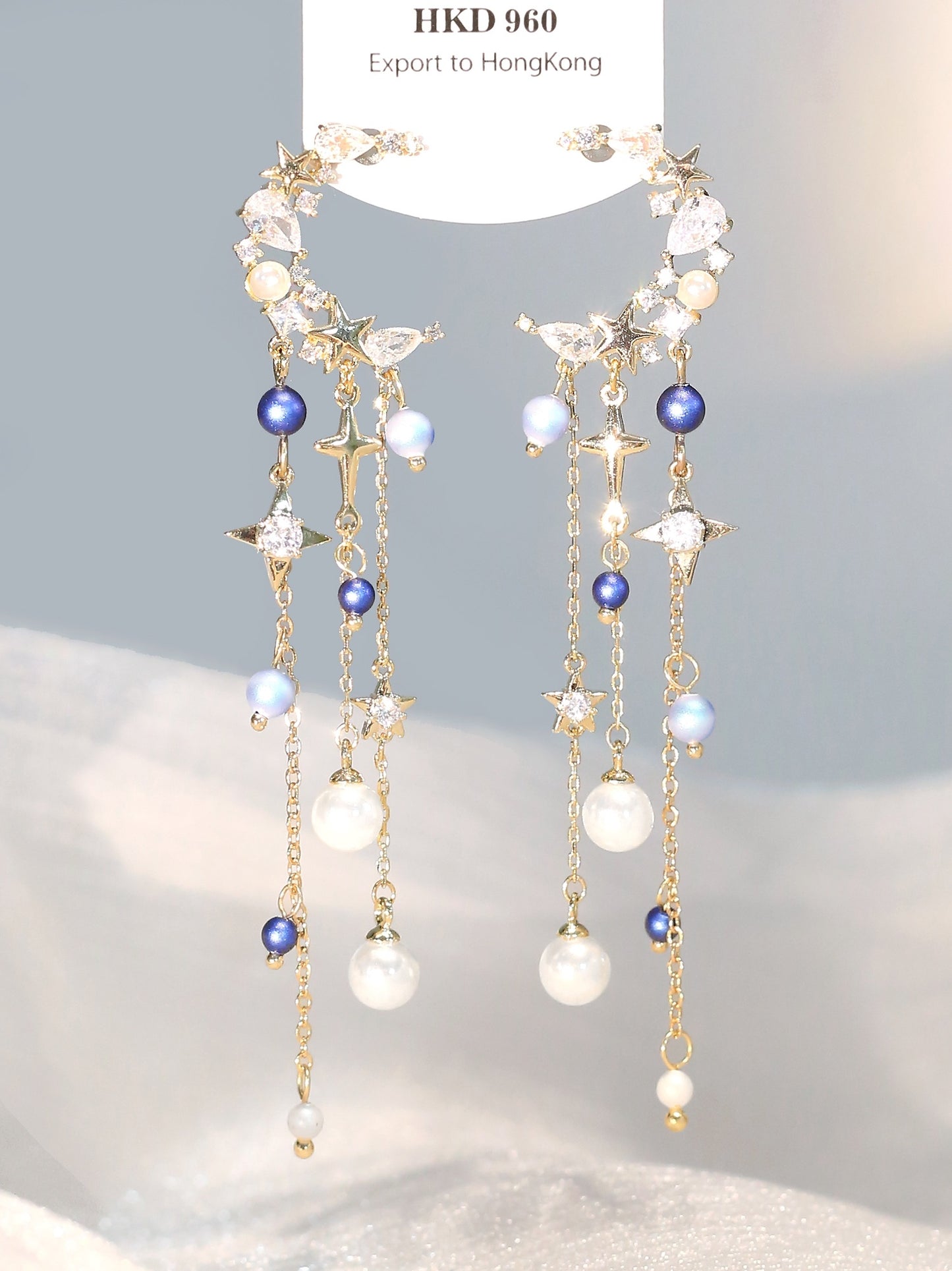 Boucles d'oreilles féeriques à effet fin avec pompon long