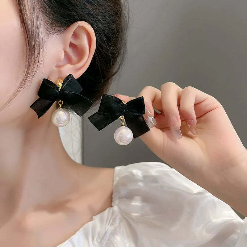 Boucles d'oreilles françaises élégantes avec nœud noir