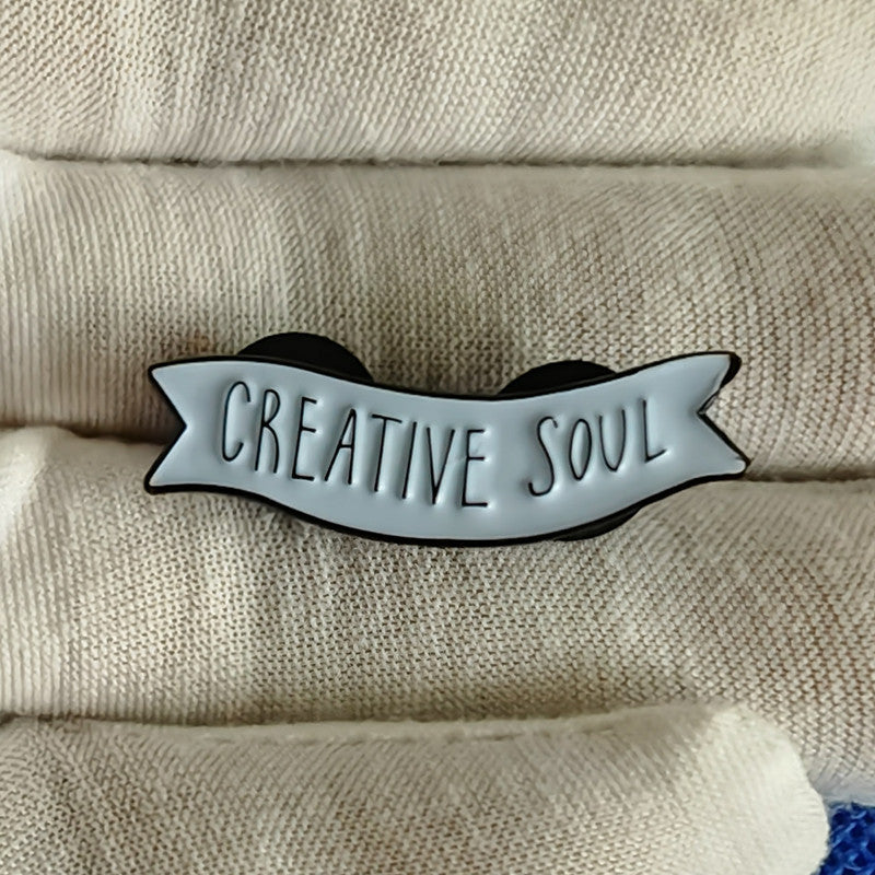 Broche d'âme créative anglaise, Badge M doré de dessin animé