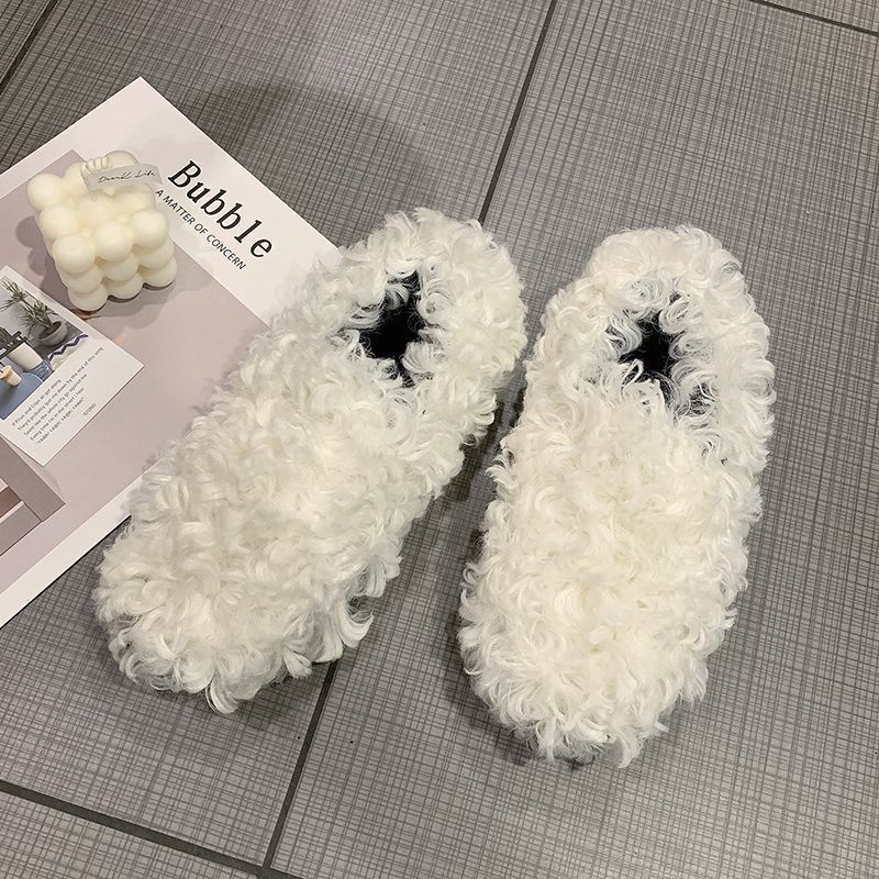 Escarpins bouclés en agneau à fond plat pour femmes