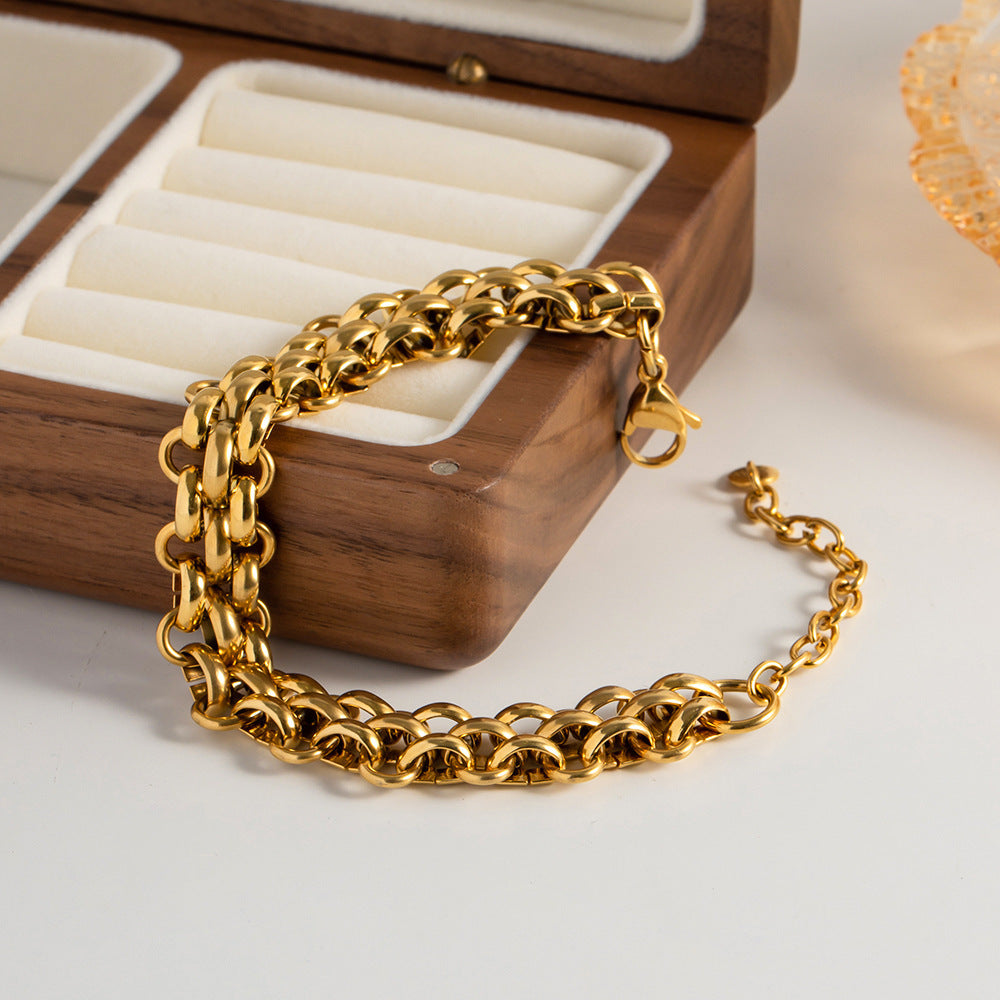 Bracelet pour femme à chaîne géométrique en acier titane et or 18 carats