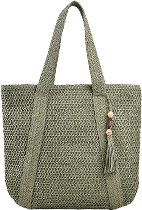 Bolso de paja para mujer con borlas tejidas en la playa
