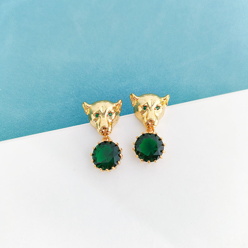Boucles d'oreilles tête de léopard en zircon vert