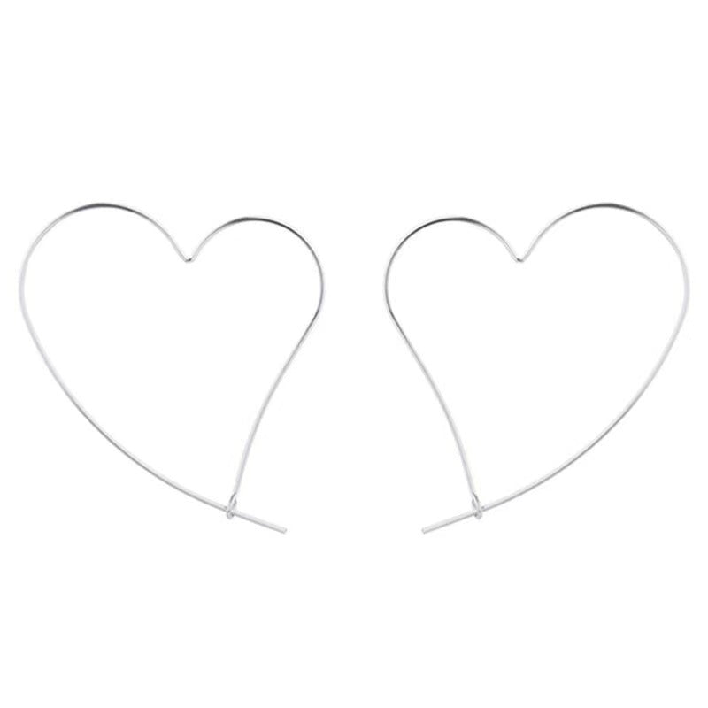 Boucles d'oreilles creuses en forme de cœur, personnalité gracieuse à la mode