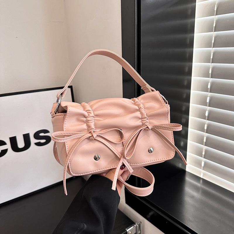 Sac à bandoulière assorti en cuir souple de style occidental