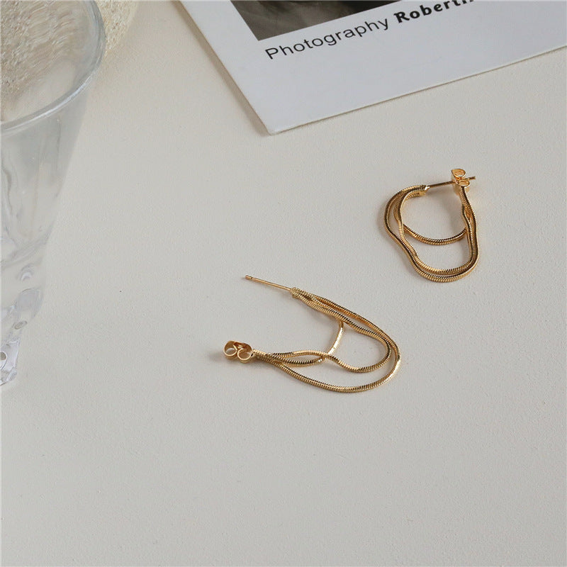 Boucles d'oreilles simples de style froid pour femmes