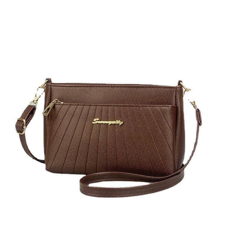 Sac messager à bandoulière pour maman d'âge moyen en losange à la mode