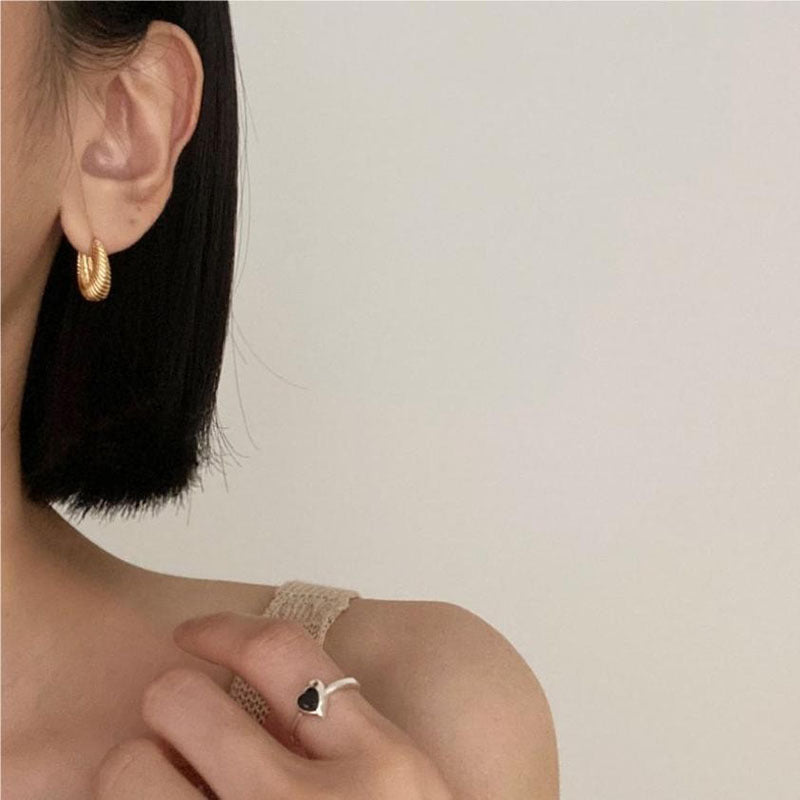 Boucles d'oreilles torsadées ondulées à ellipse géométrique simple pour femmes